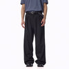 UNF Lyocell Loose Versatile Anti-Wrinkle Double-pleated Trousers worn with a casual belt and stylish top.