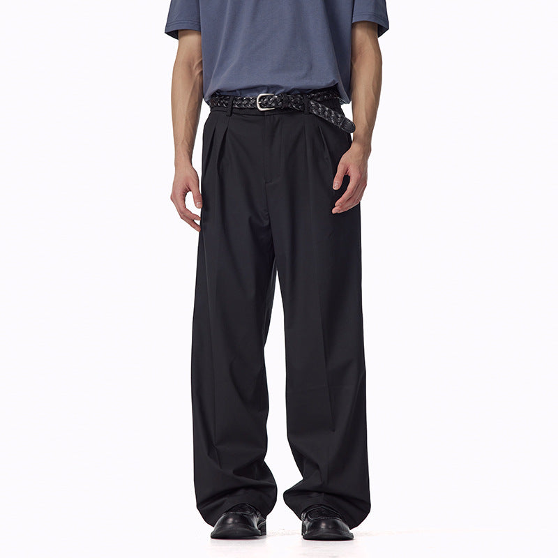 UNF Lyocell Loose Versatile Anti-Wrinkle Double-pleated Trousers worn with a casual belt and stylish top.